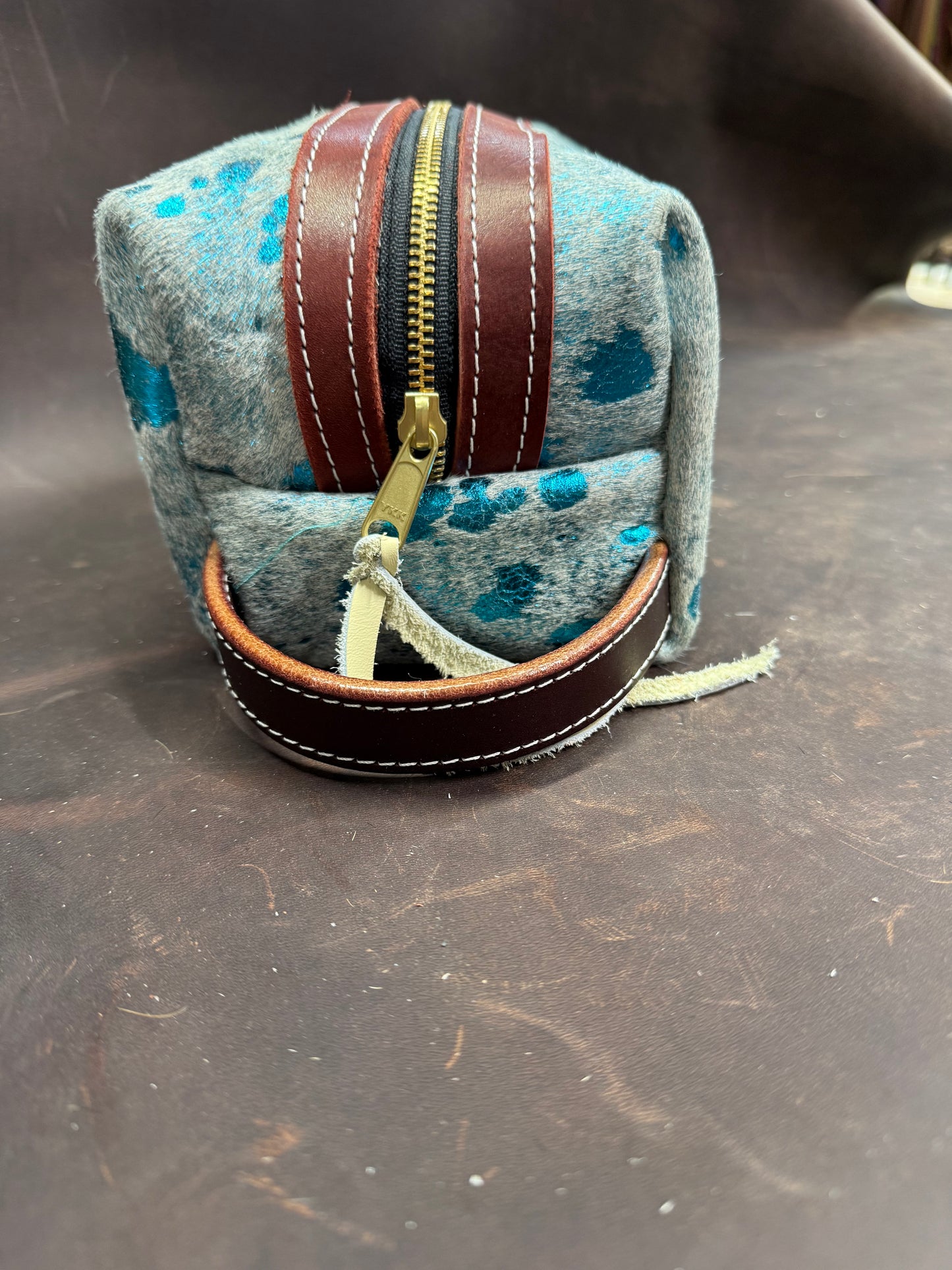 Blue acid wash hair on bag