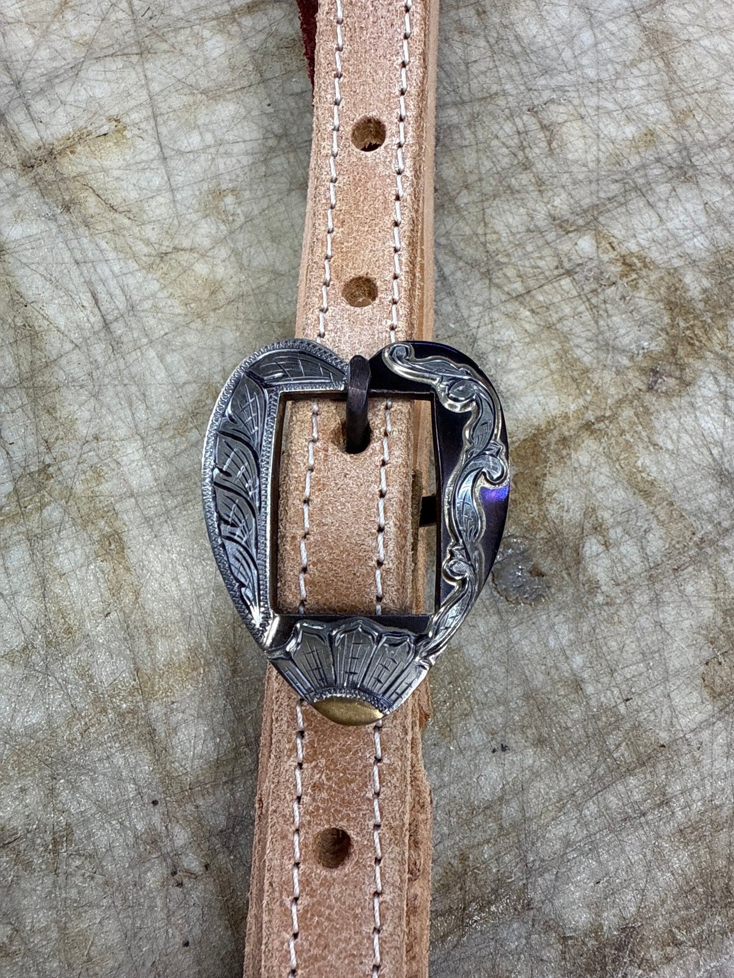 B. Mauney buckle