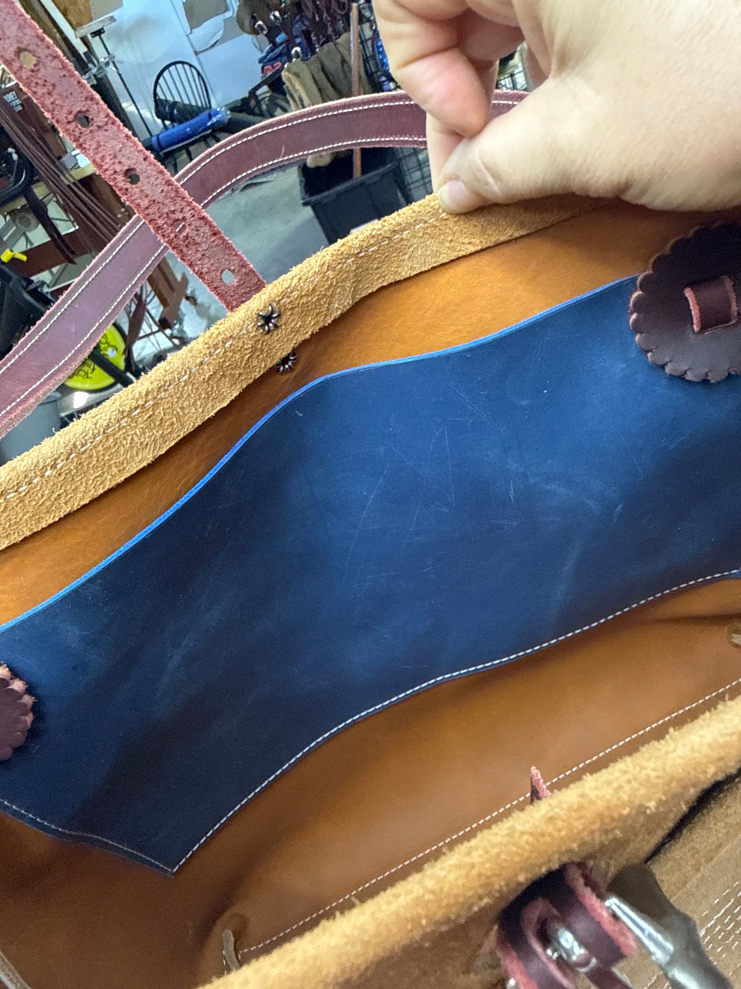 Tan ruff out tote with fancy hardware
