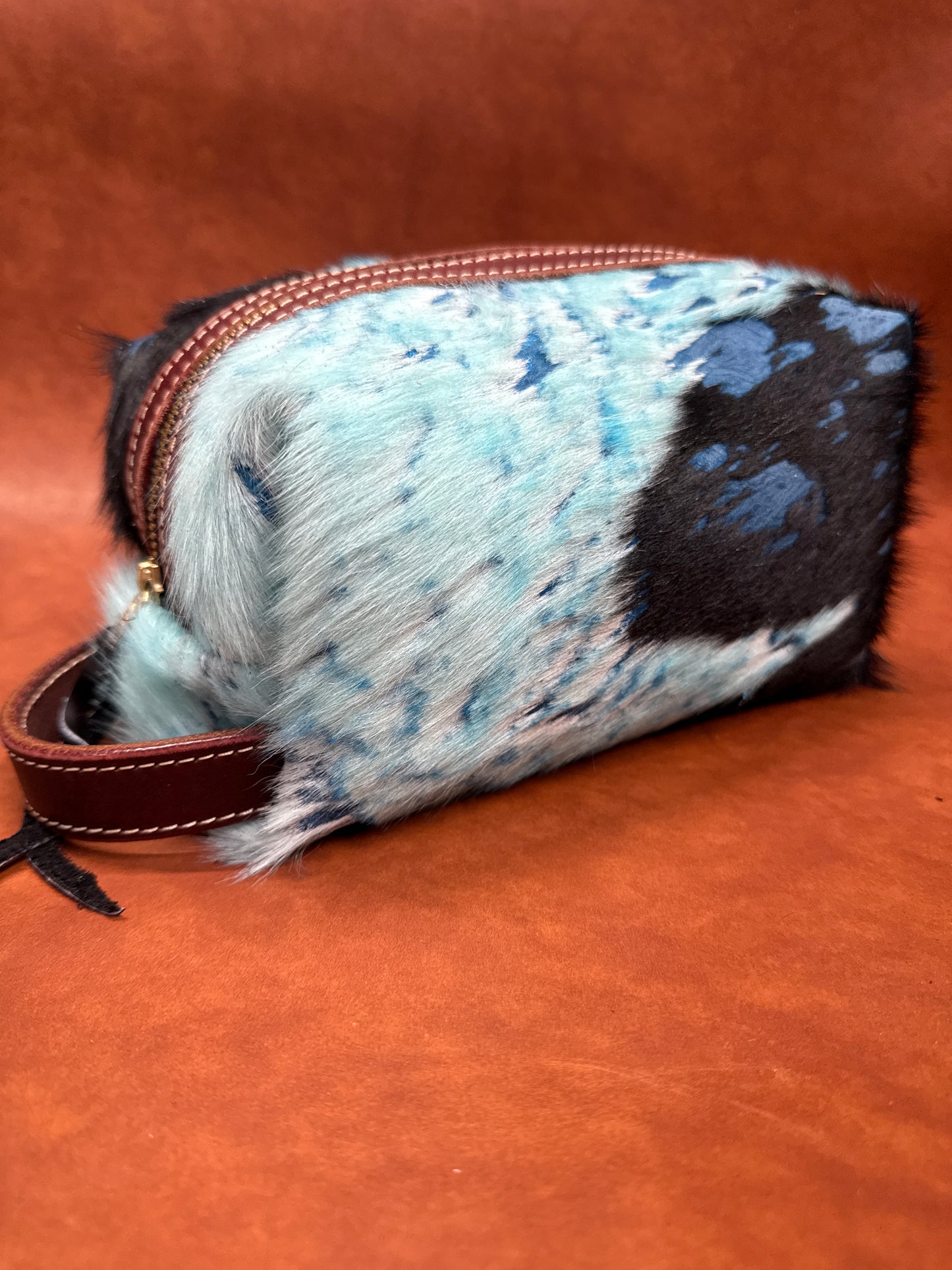 Blue and black hair on hide