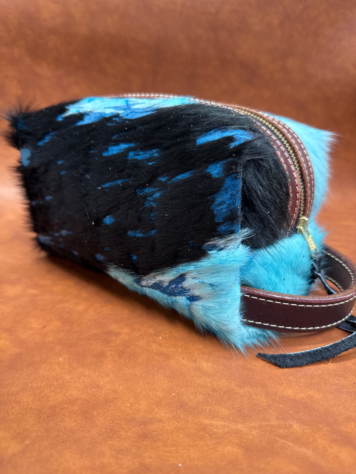 Blue and black hair on hide