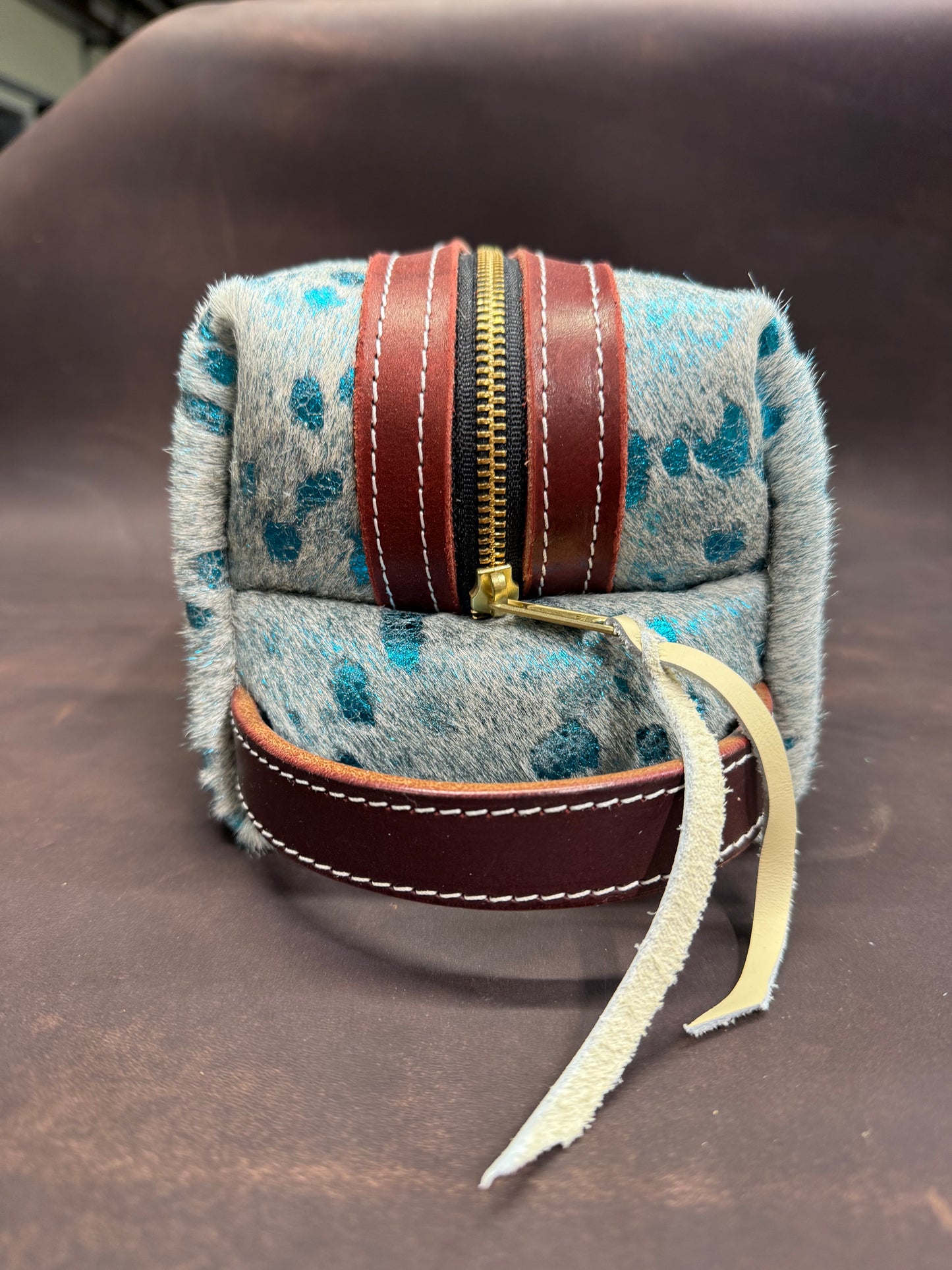 Blue acid wash hair on bag