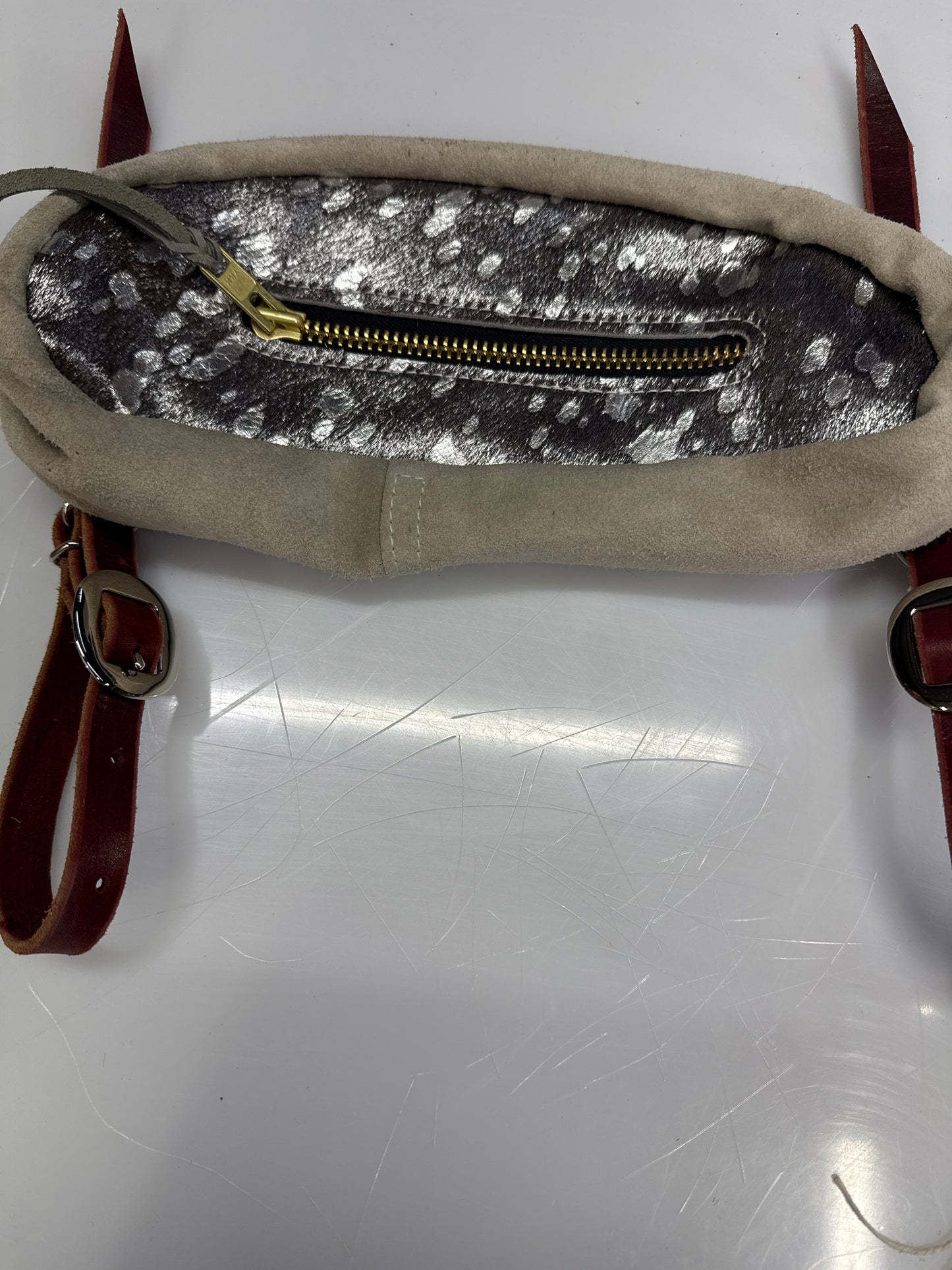 Small silver hair on bag