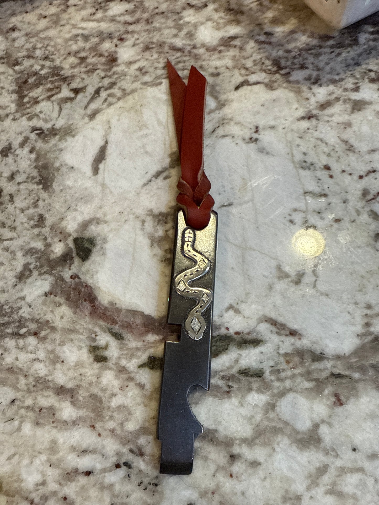 Silver snake EDC tool