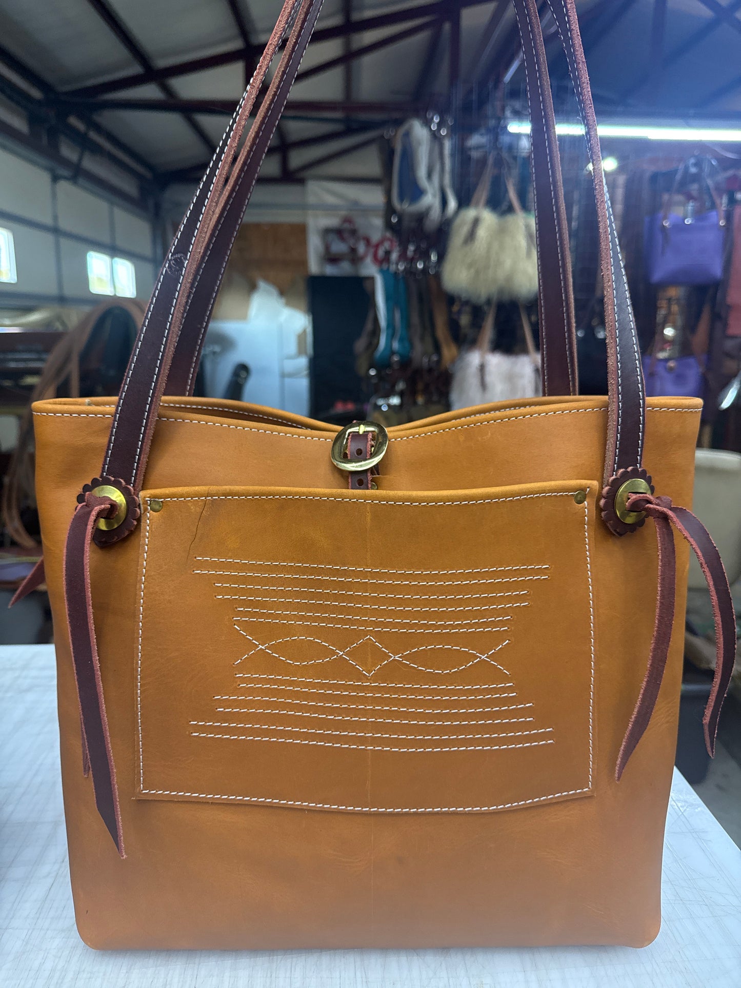 Tan tote brass hardware