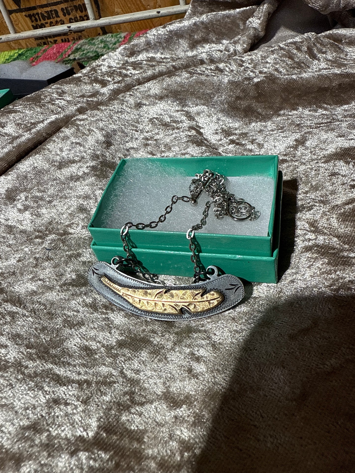 Feather pendent