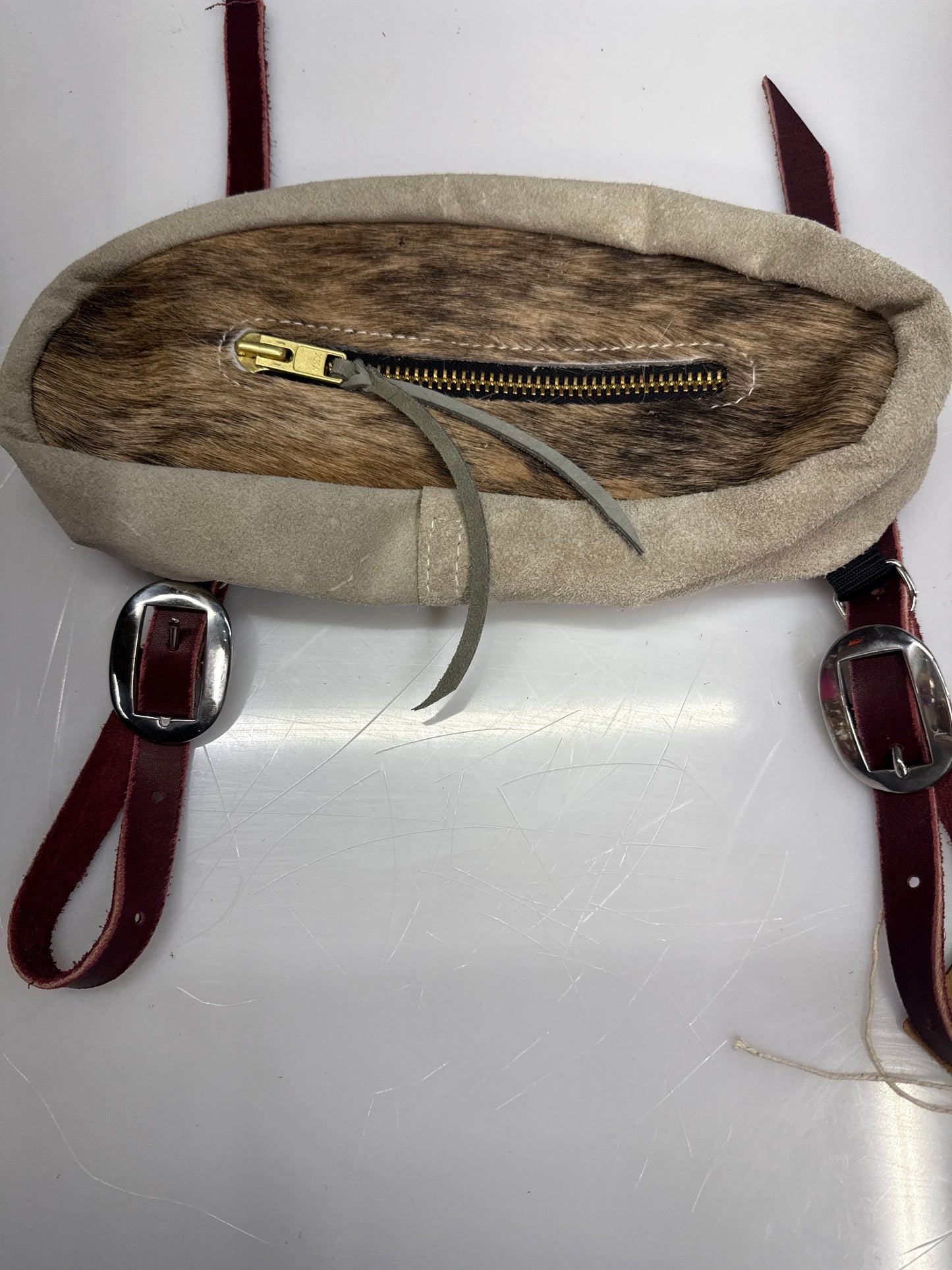 Brown hair on hide small bag