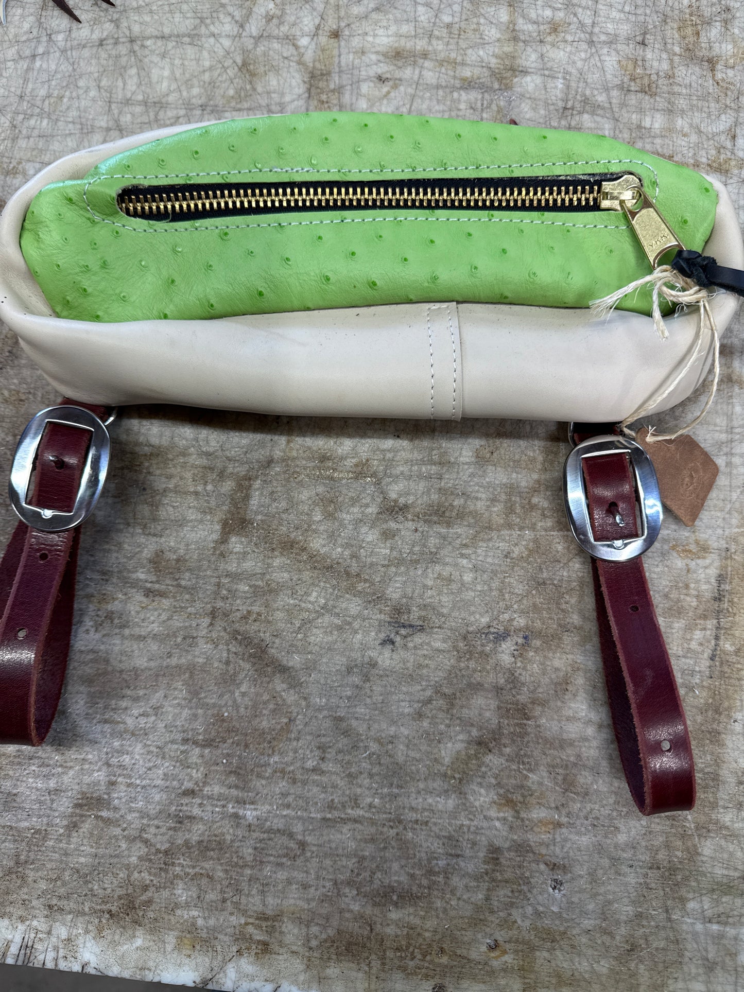 Green ostrich small cantle bag