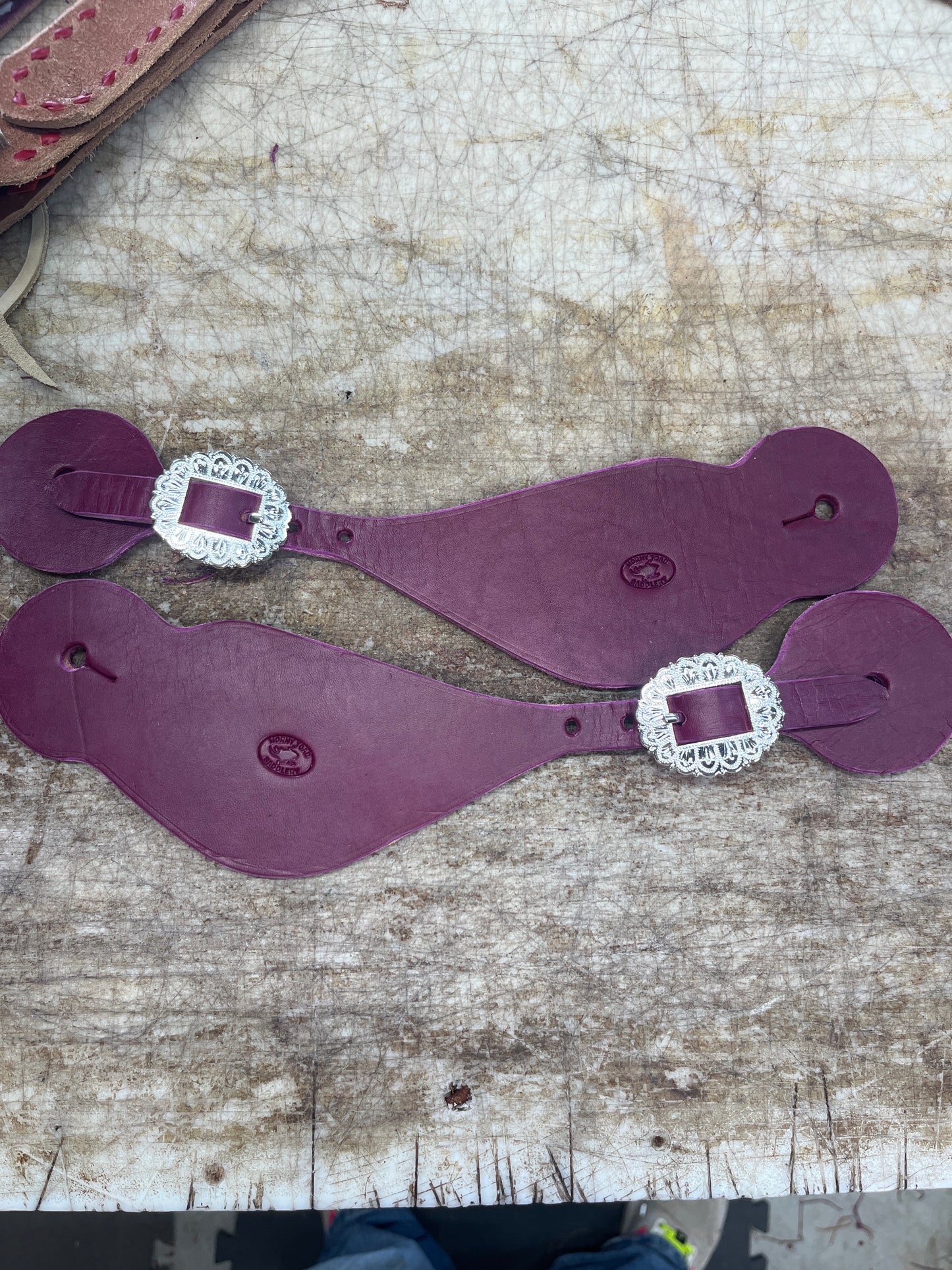 Large burgundy spur straps