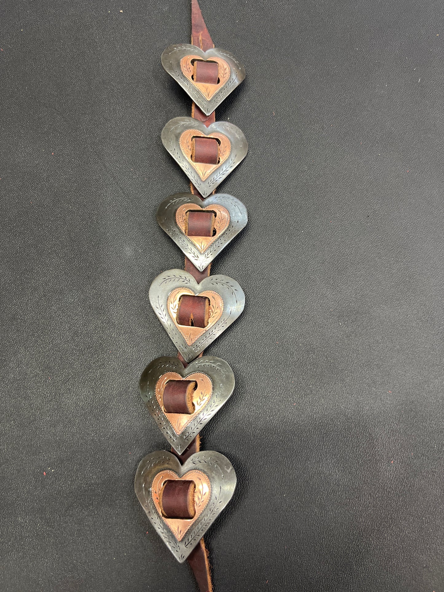 Heart conchos