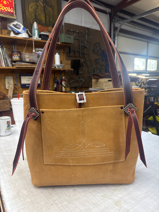 Tan ruff out tote with fancy hardware