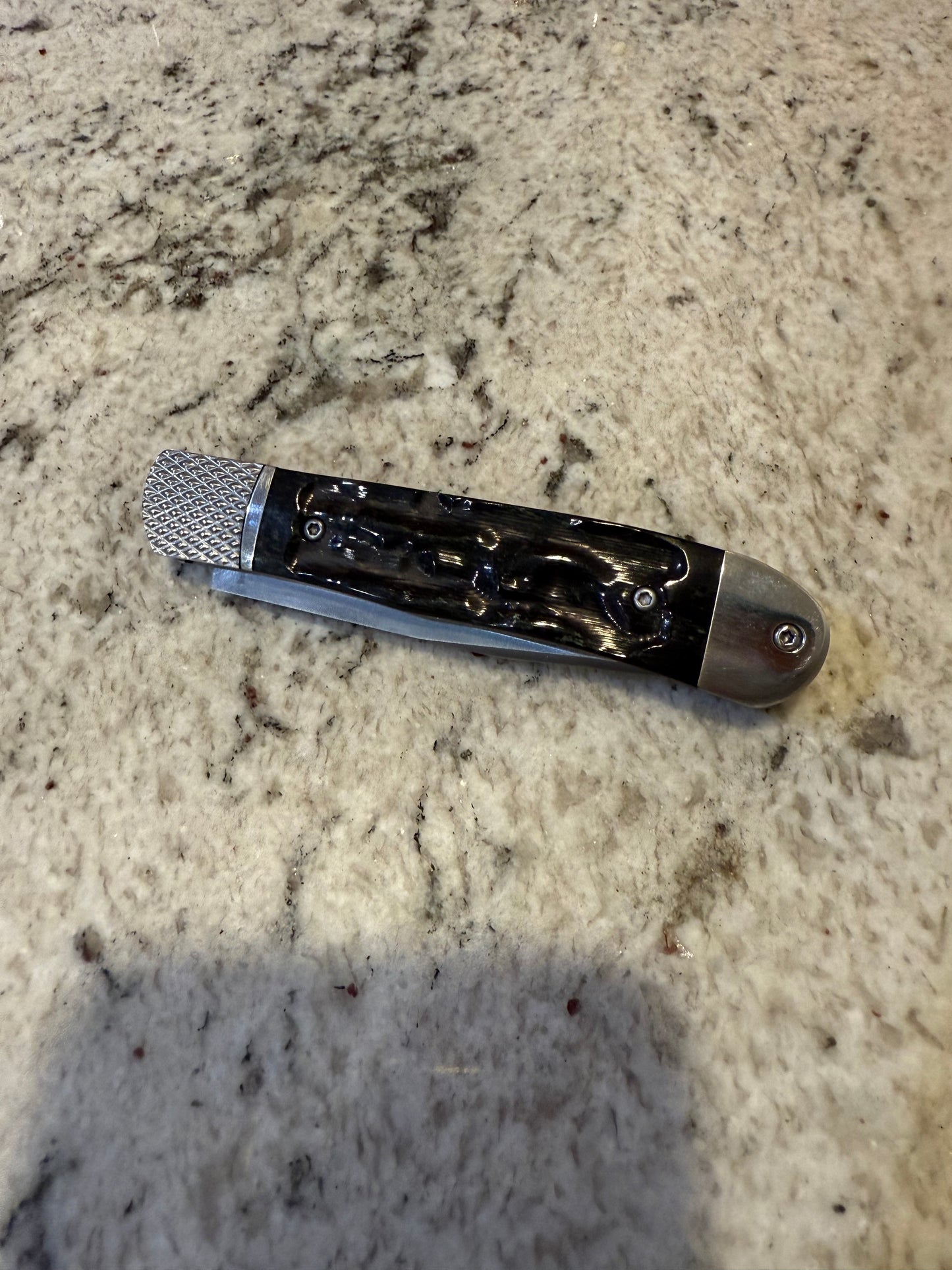 Black Spring loaded knife