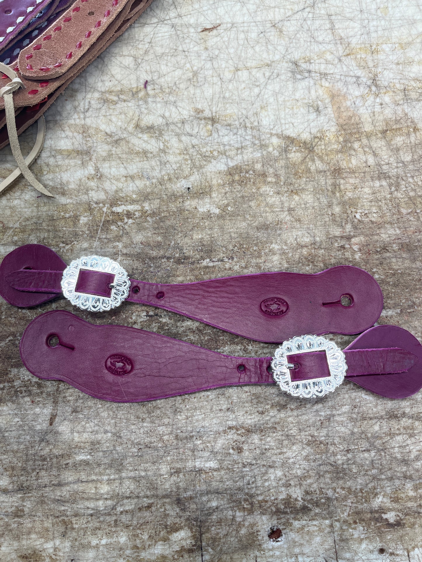 Burgundy spur straps