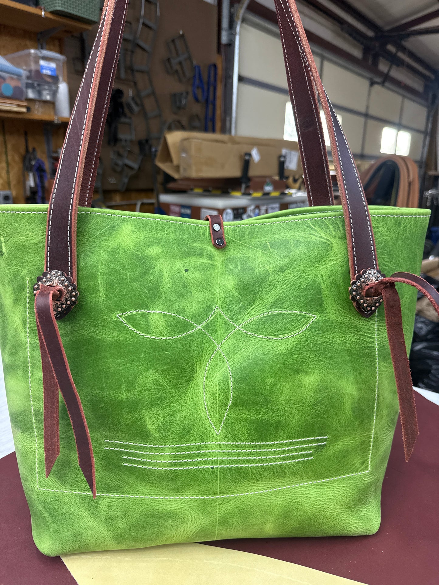 Green pull up tote with copper hardware