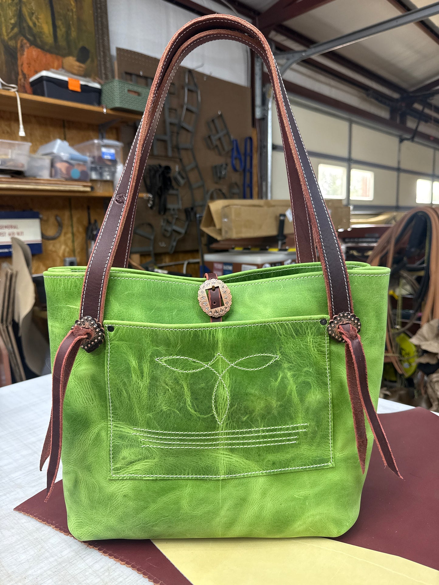 Green pull up tote with copper hardware
