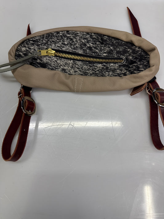 Black and white hair on small bag