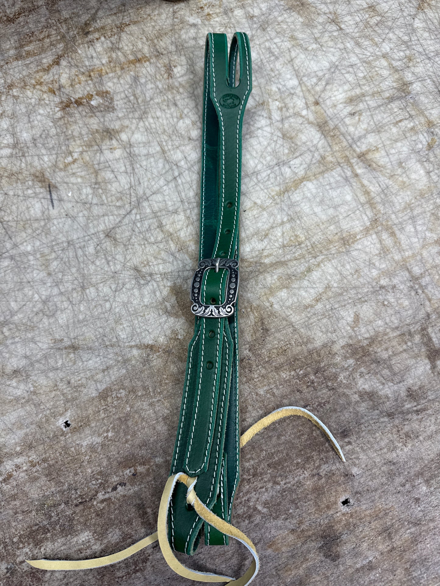 Green horse shoe brand buckle