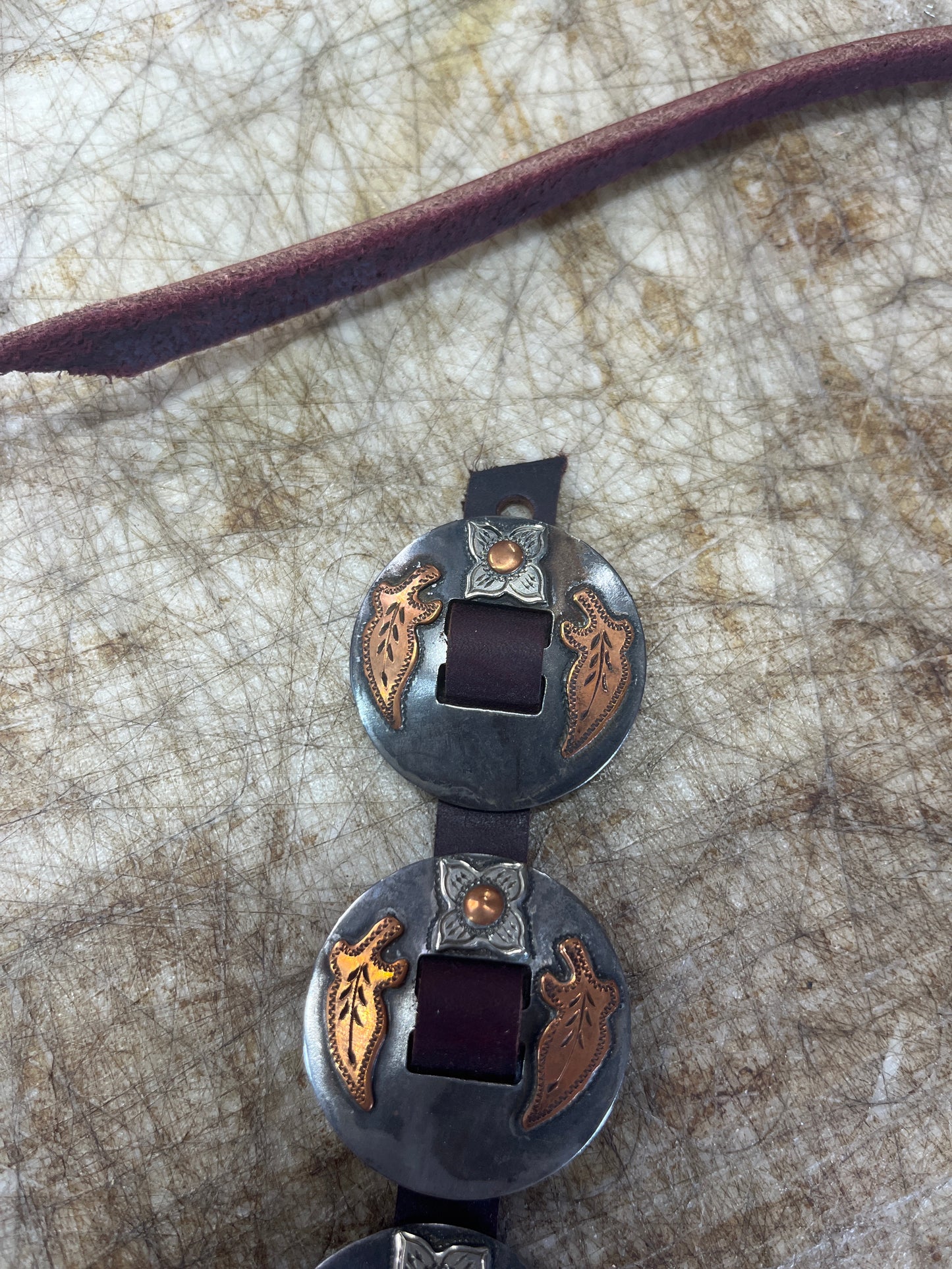 Flower conchos