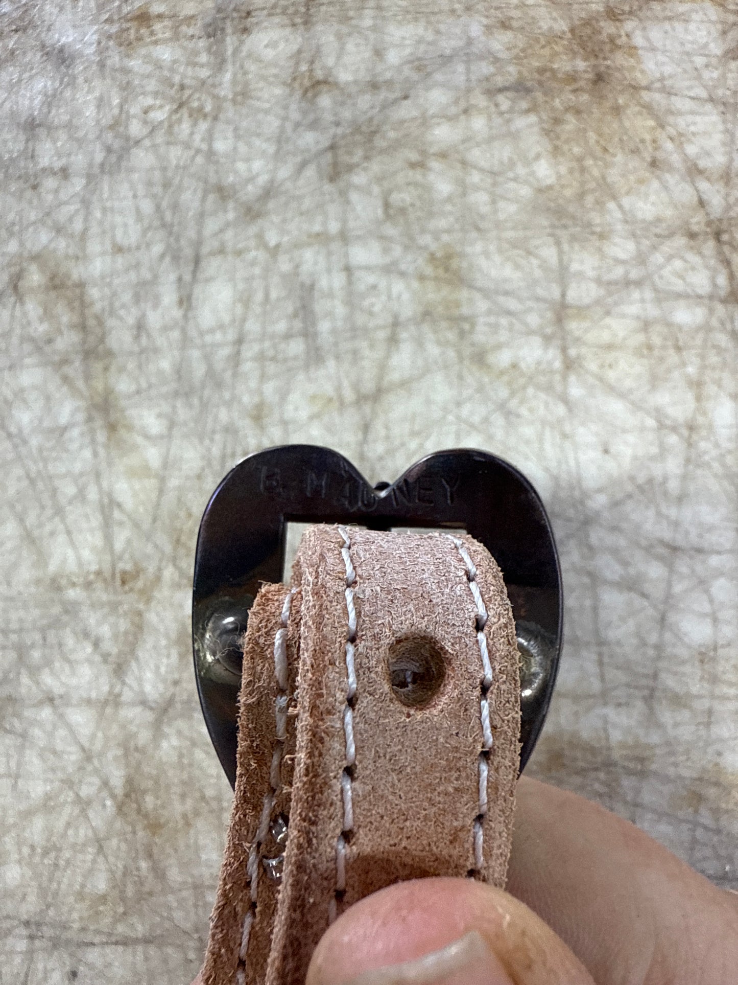 B. Mauney buckle