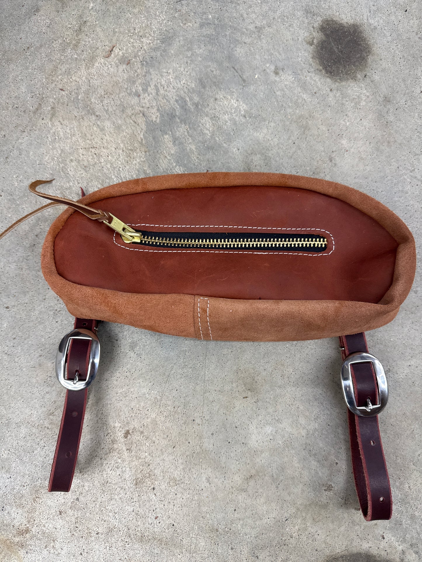 Rust smooth small cantle bags.