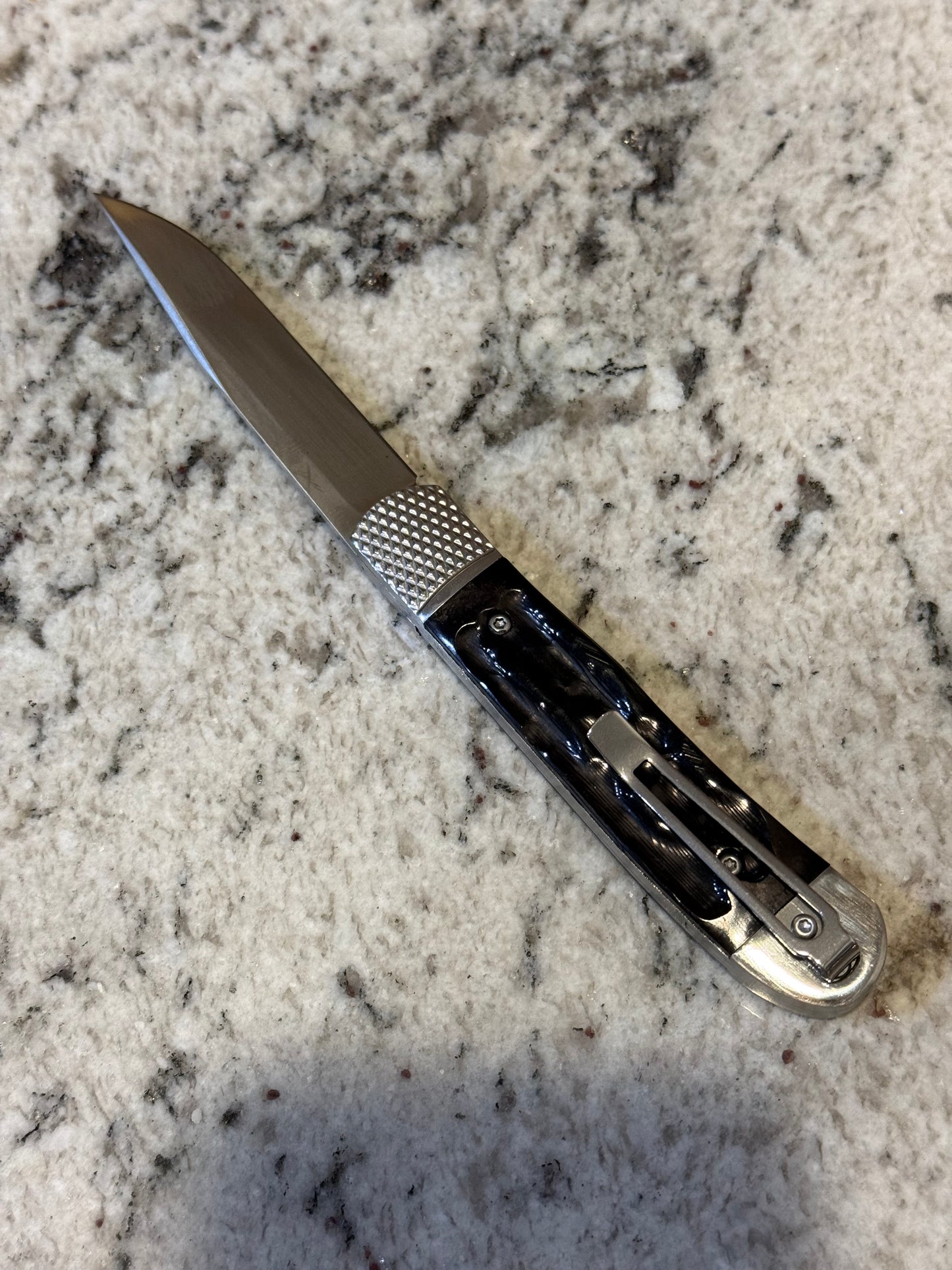 Black Spring loaded knife