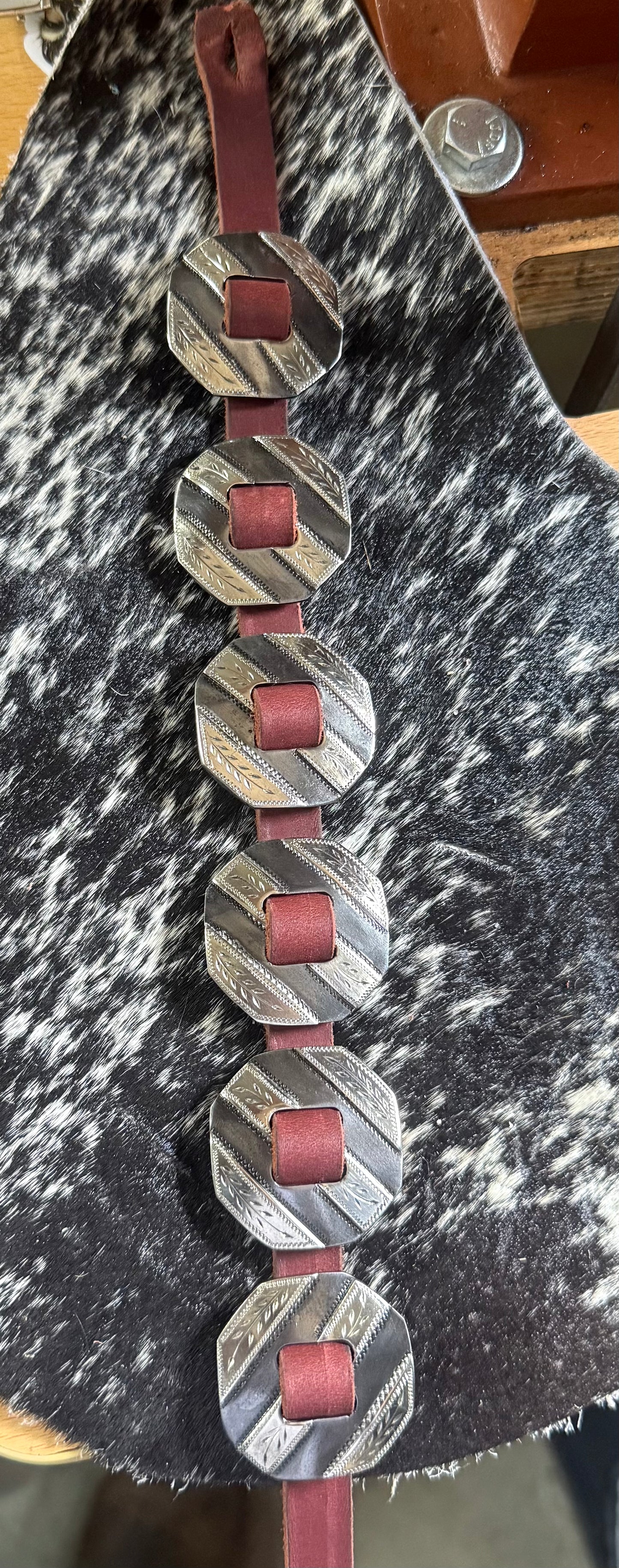 Stripe conchos