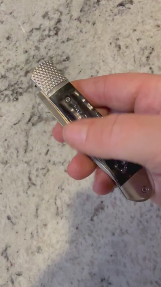 Black Spring loaded knife