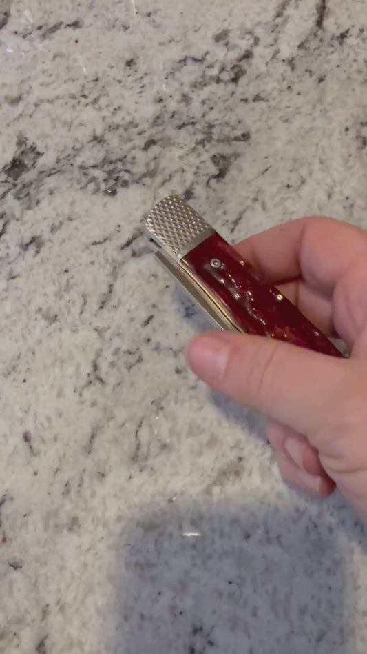 Red spring load Knife