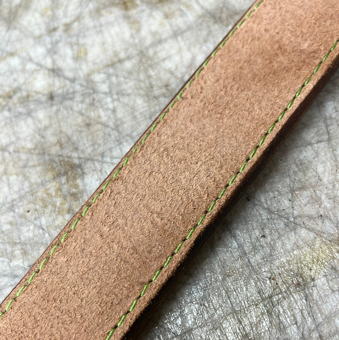 Green stitched belt